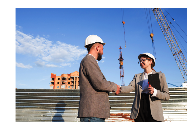 Professional engineers at Construction site before strategic planning implementation.